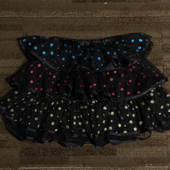 It’s a glitter skirt all black with sparkly dots - Picture 3 of 4